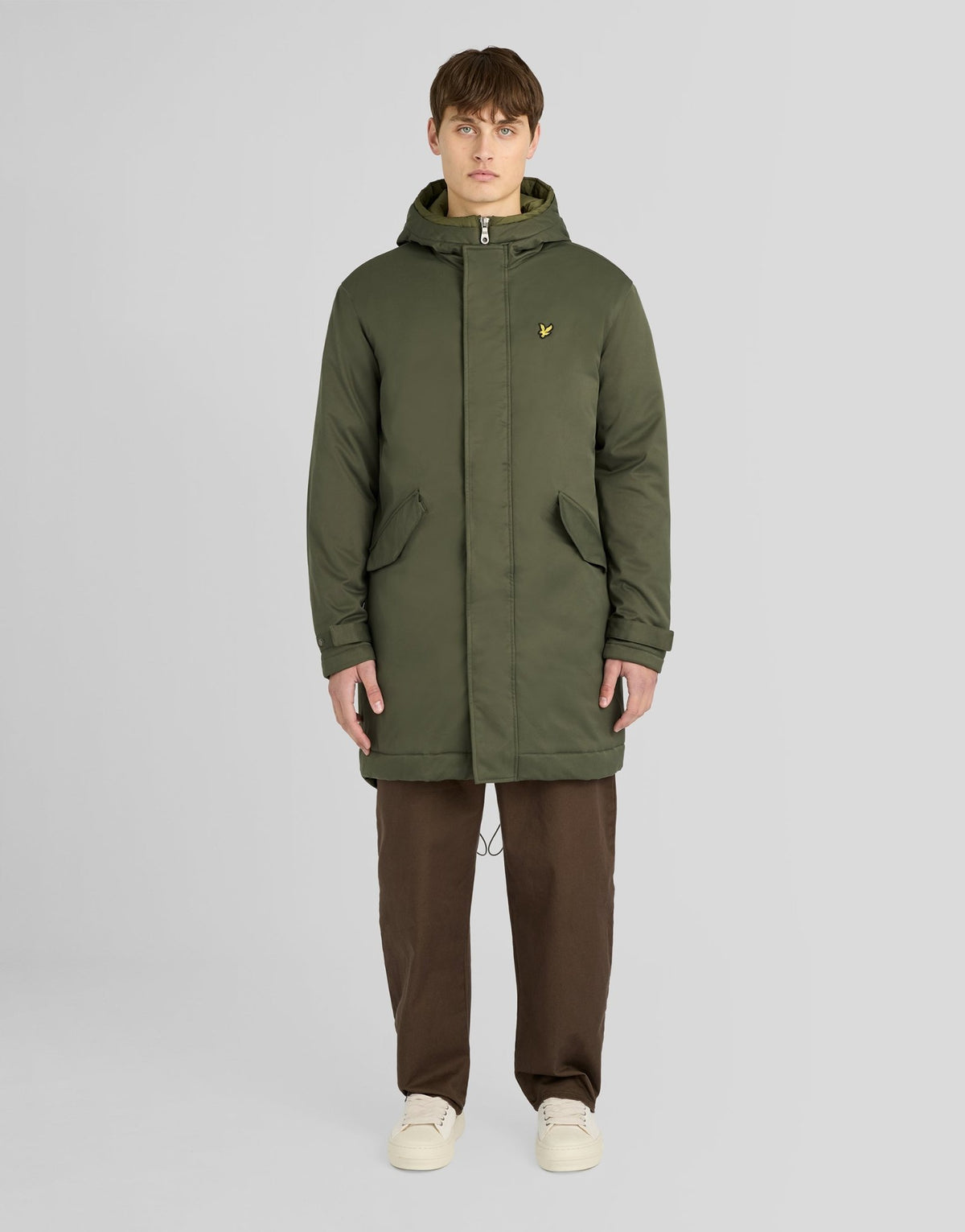 Man wears Padded Fishtail Parka in Deep Depths