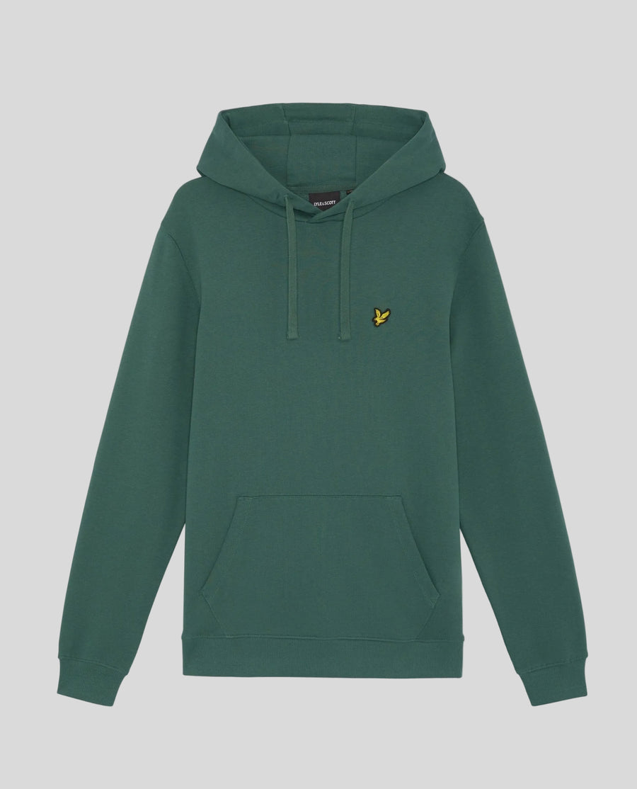 L'uomo indossa una felpa con cappuccio Loopback in cotone color Everglade