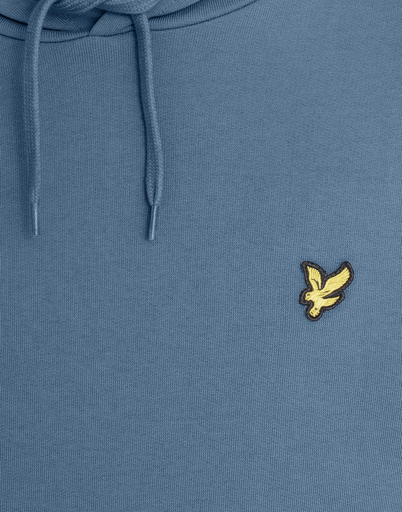 Man wears Everyday Loopback Cotton Hoodie in Ocean Sky