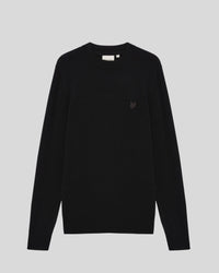 Man wears Cashmere Crew Neck Jumper in Lacquer
