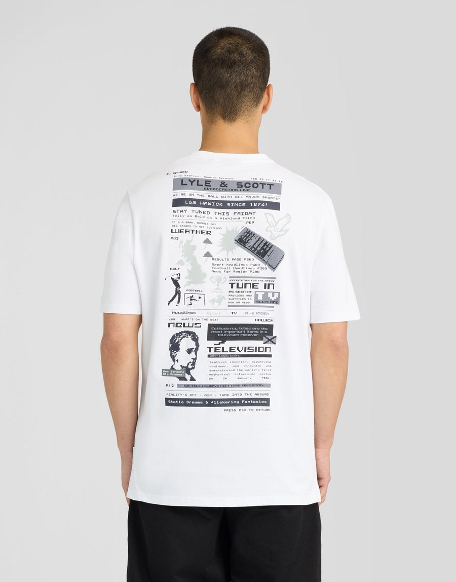 Man wears TV Pixel Back Graphic T-Shirt in White