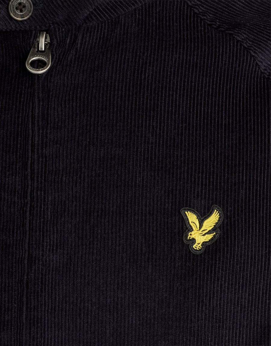 Man wears Corduroy Harrington Jacket in Dark Navy
