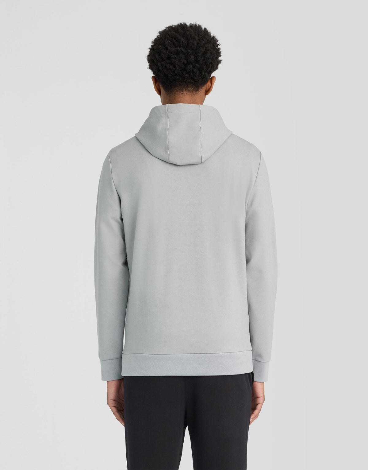 Man wears Sports Lightweight Hoodie in Ultimate Grey