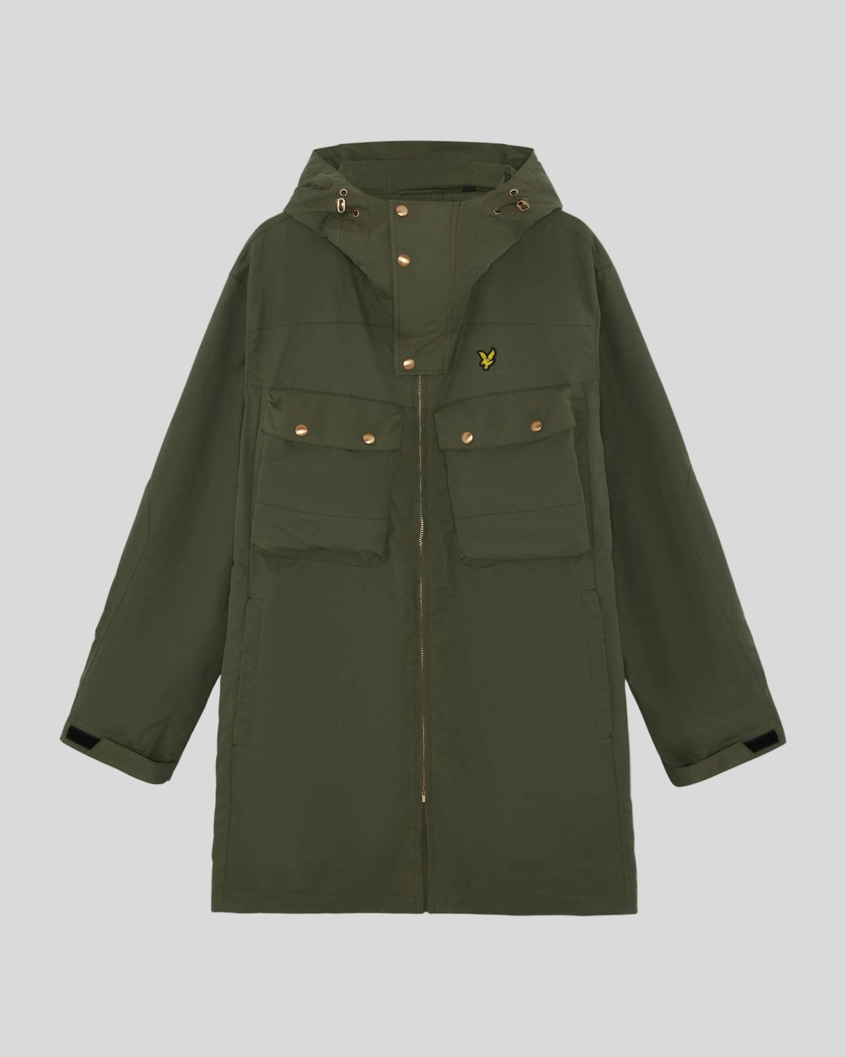 Man wears Waxed Guard Parka in True Olive